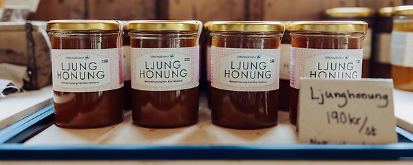 Burkar med olika typer av honung